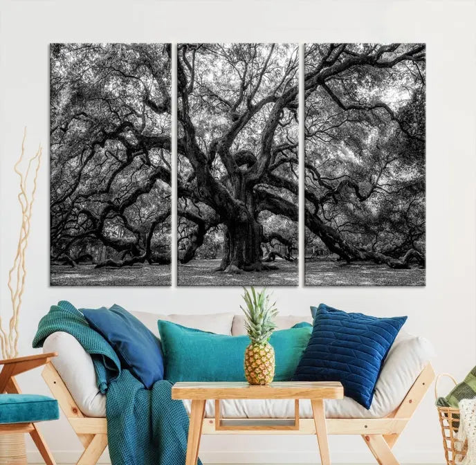 The living room features the Black and White Old Angel Oak Tree Wall Art Canvas Print, showcasing a three-panel black and white tree artwork.