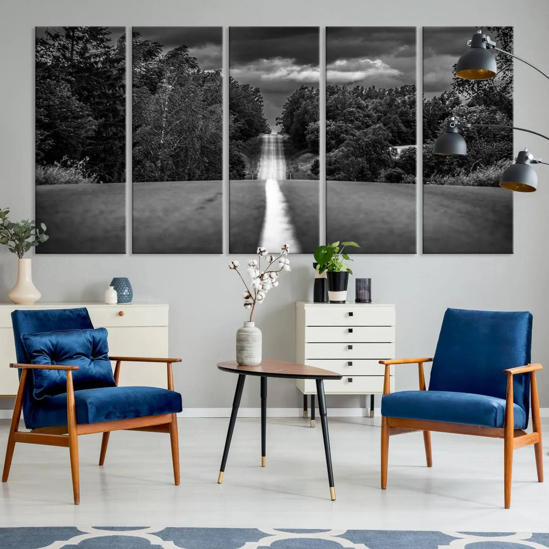 The Black and White Road in Forest Wall Art Canvas Print captures a rural road disappearing into the distance under cloudy skies, presented as a triptych. These gallery-wrapped canvases boast museum-quality construction and a UV-protective coating.