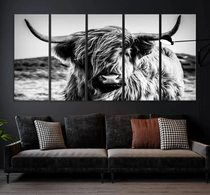 The "Black and White Scottish Cow Canvas Wall Art," a three-panel piece featuring a long-haired cow with large horns, enhances the room with its farmhouse decor charm.