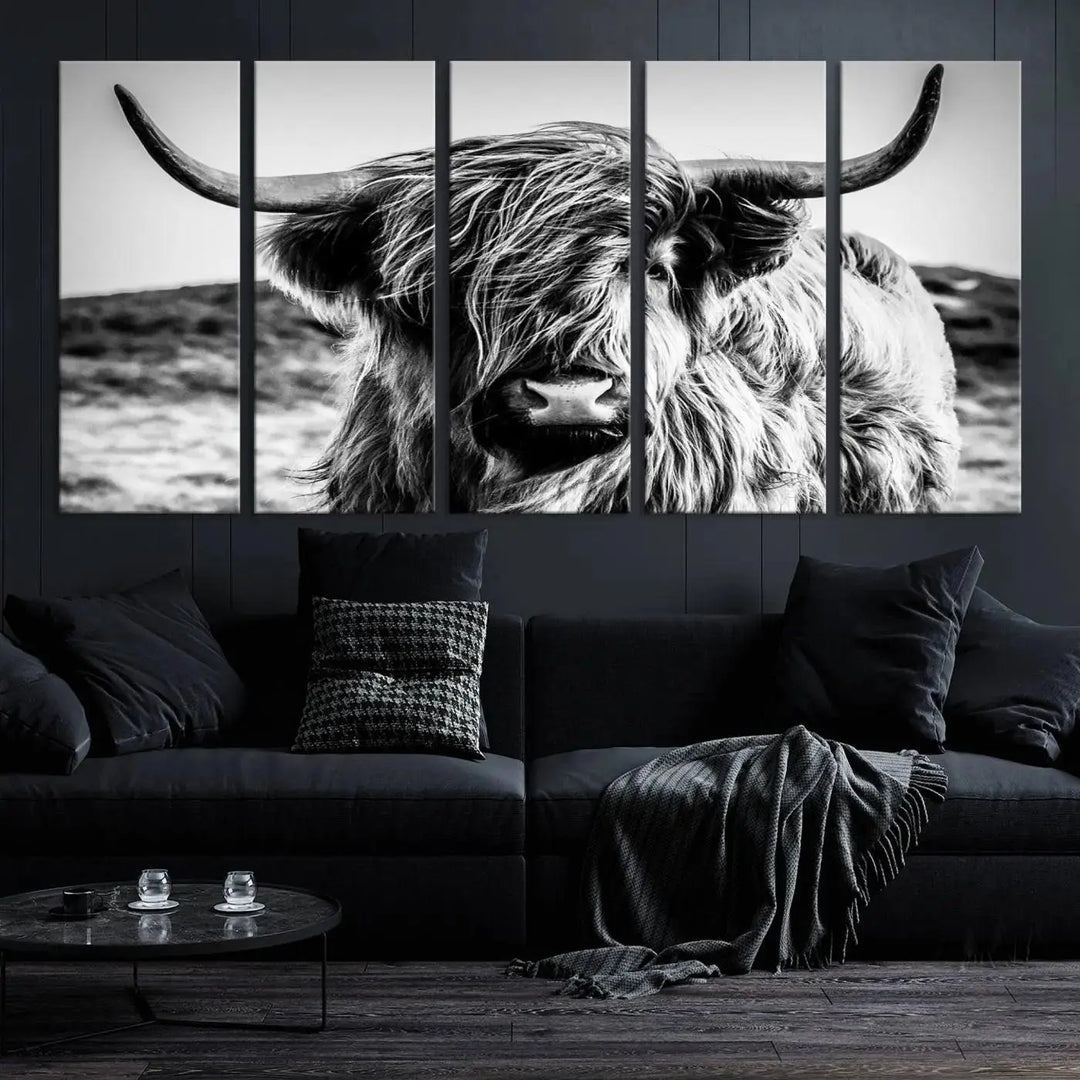 The "Black and White Scottish Cow Canvas Wall Art," a three-panel piece featuring a long-haired cow with large horns, enhances the room with its farmhouse decor charm.