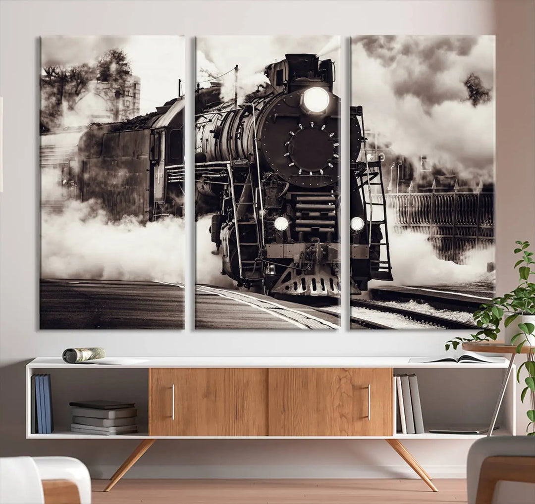 The living room showcases a triptych of the Black and White Steam Locomotive Canvas Wall Art Print.