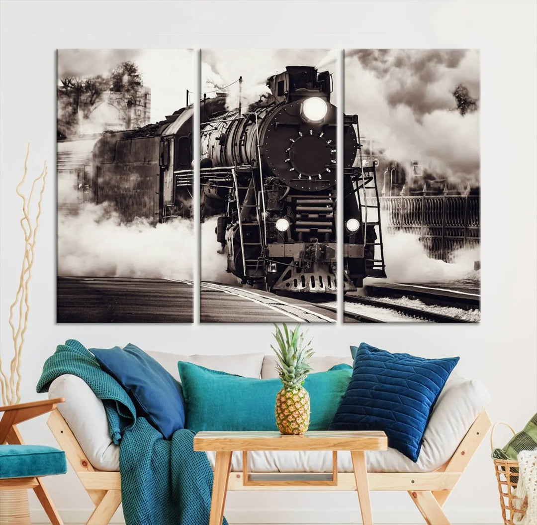 The living room showcases a triptych of the Black and White Steam Locomotive Canvas Wall Art Print.