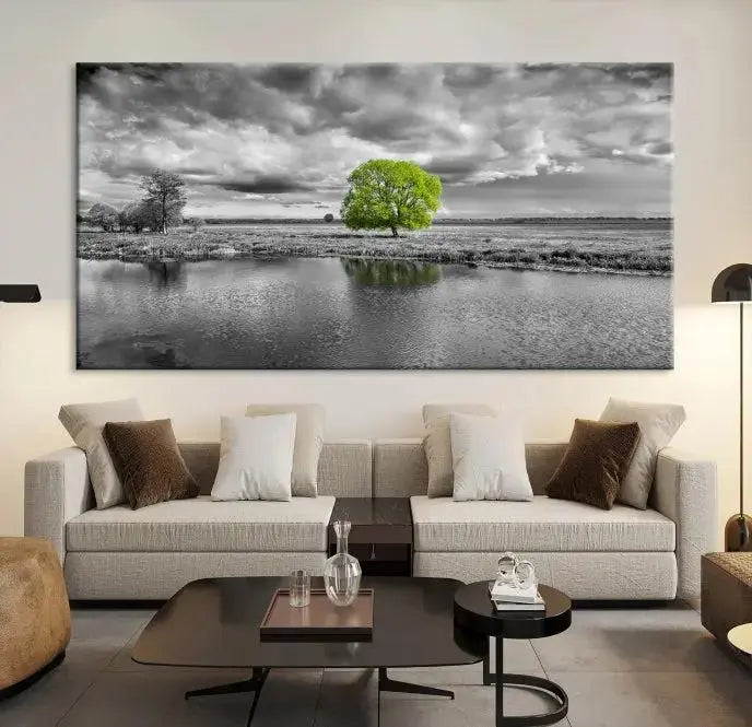 The Black and White Tree Landscape Painting Wall Art Tree Canvas Print is a stunning triptych that features a monochrome landscape punctuated with a single vivid green tree. The pieces are printed on museum-quality canvases, offering both durability and style, and are complemented by a UV-protective coating for added longevity.