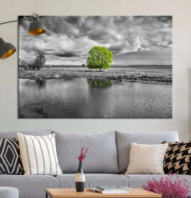 The Black and White Tree Landscape Painting Wall Art Tree Canvas Print is a stunning triptych that features a monochrome landscape punctuated with a single vivid green tree. The pieces are printed on museum-quality canvases, offering both durability and style, and are complemented by a UV-protective coating for added longevity.