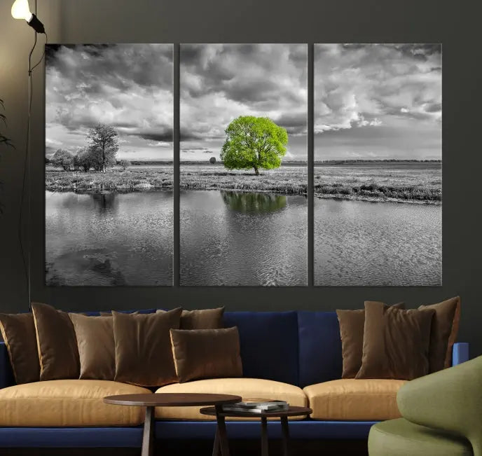 The Black and White Tree Landscape Painting Wall Art Tree Canvas Print is a stunning triptych that features a monochrome landscape punctuated with a single vivid green tree. The pieces are printed on museum-quality canvases, offering both durability and style, and are complemented by a UV-protective coating for added longevity.