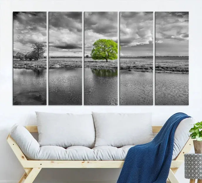 The Black and White Tree Landscape Painting Wall Art Tree Canvas Print is a stunning triptych that features a monochrome landscape punctuated with a single vivid green tree. The pieces are printed on museum-quality canvases, offering both durability and style, and are complemented by a UV-protective coating for added longevity.