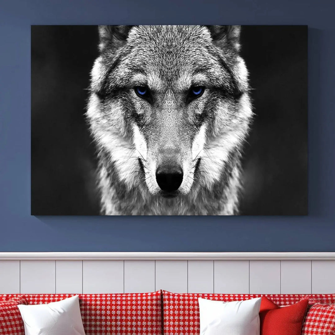 The Black and White Wild Wolf Wall Art Canvas Print, featuring a wolf with striking blue eyes, beautifully enhances any space. As a museum-quality piece with UV-protective coating and ready-to-hang design, it effortlessly brings elegance and convenience to your room.