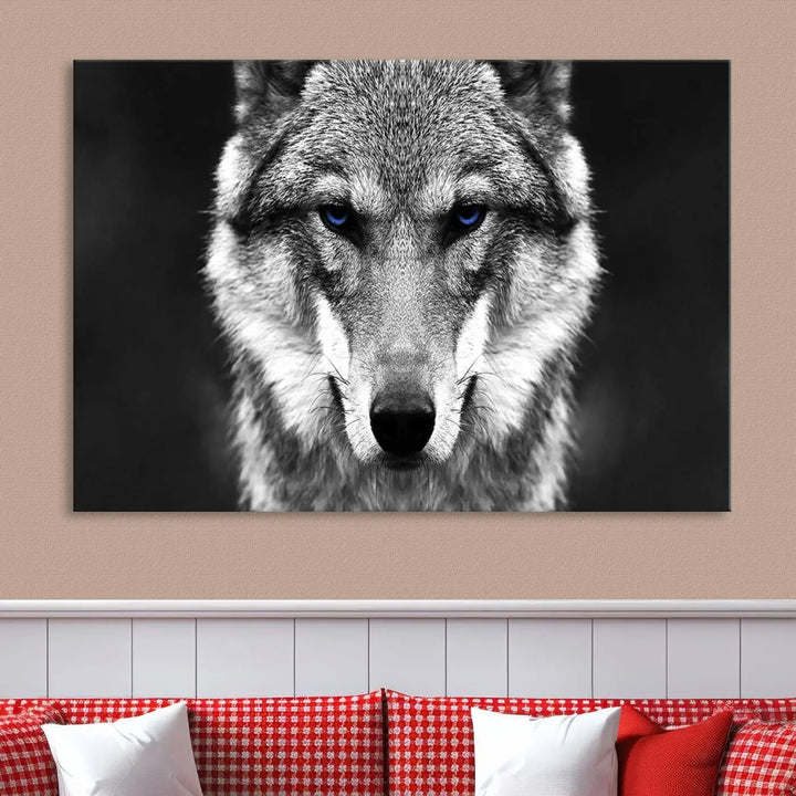 The Black and White Wild Wolf Wall Art Canvas Print, featuring a wolf with striking blue eyes, beautifully enhances any space. As a museum-quality piece with UV-protective coating and ready-to-hang design, it effortlessly brings elegance and convenience to your room.