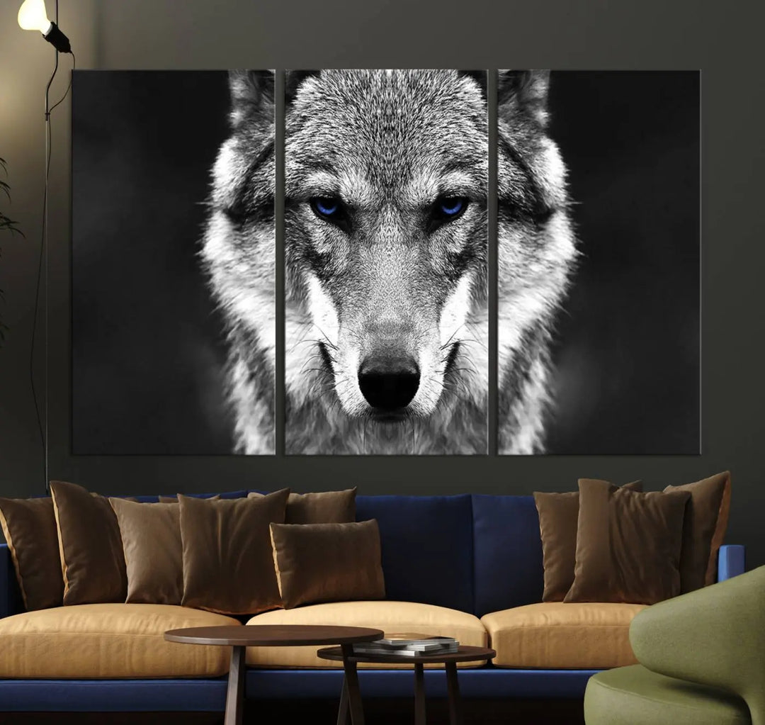 The Black and White Wild Wolf Wall Art Canvas Print, featuring a wolf with striking blue eyes, beautifully enhances any space. As a museum-quality piece with UV-protective coating and ready-to-hang design, it effortlessly brings elegance and convenience to your room.