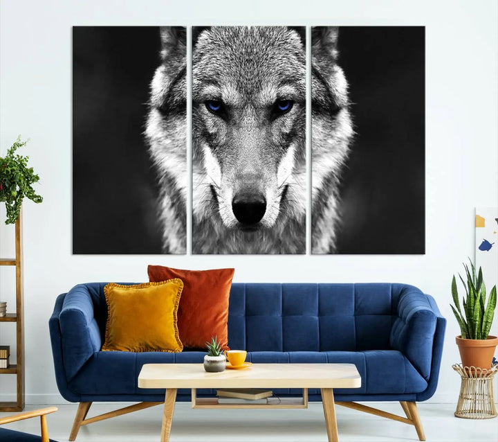 The Black and White Wild Wolf Wall Art Canvas Print, featuring a wolf with striking blue eyes, beautifully enhances any space. As a museum-quality piece with UV-protective coating and ready-to-hang design, it effortlessly brings elegance and convenience to your room.