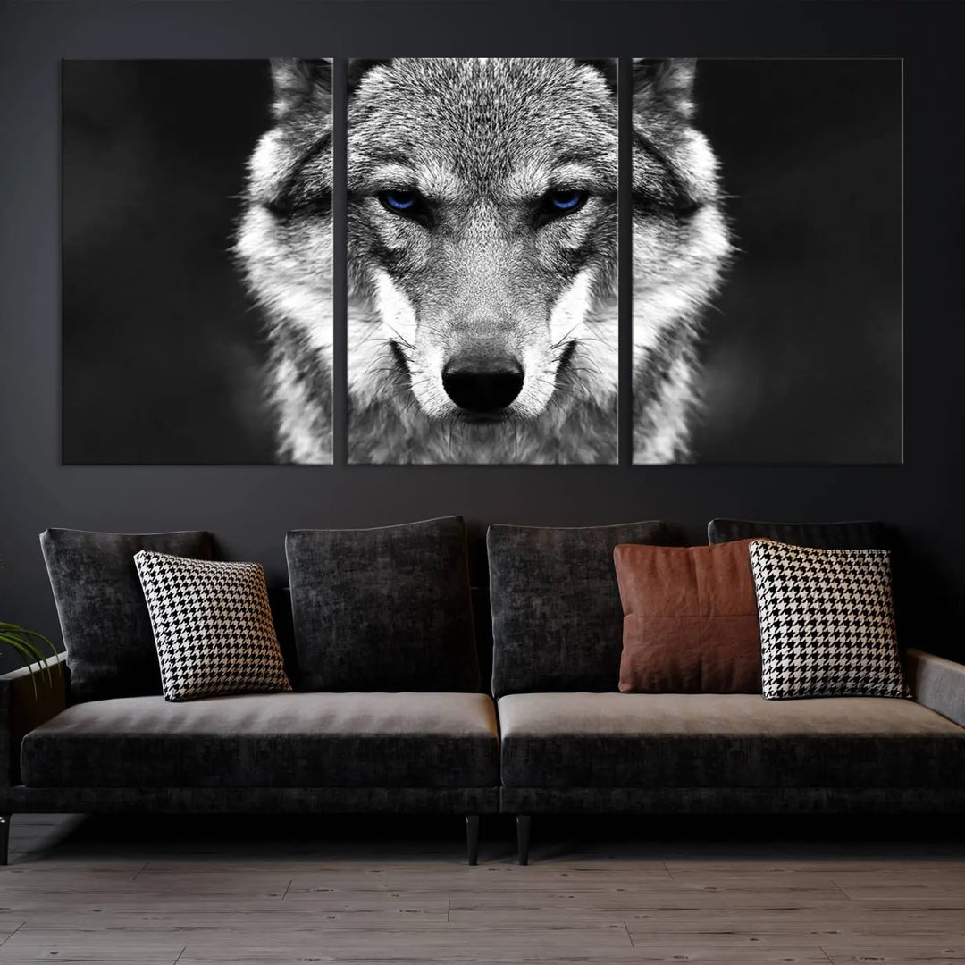 The Black and White Wild Wolf Wall Art Canvas Print, featuring a wolf with striking blue eyes, beautifully enhances any space. As a museum-quality piece with UV-protective coating and ready-to-hang design, it effortlessly brings elegance and convenience to your room.