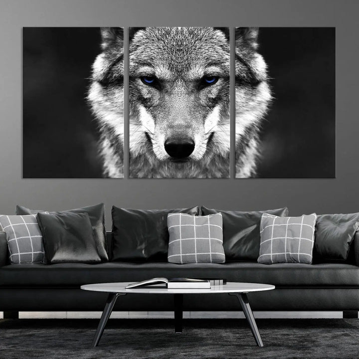 The Black and White Wild Wolf Wall Art Canvas Print, featuring a wolf with striking blue eyes, beautifully enhances any space. As a museum-quality piece with UV-protective coating and ready-to-hang design, it effortlessly brings elegance and convenience to your room.