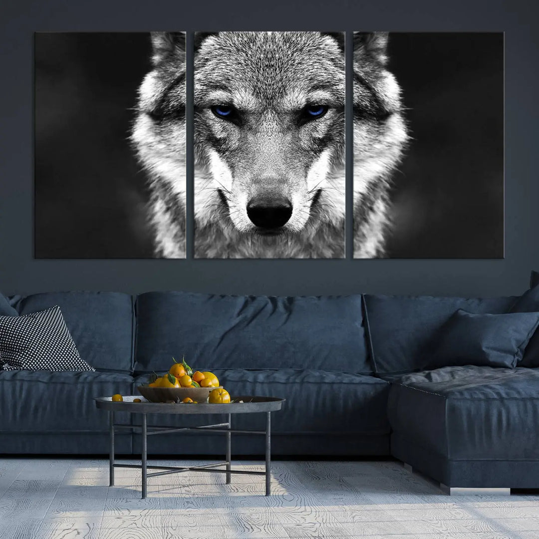 The Black and White Wild Wolf Wall Art Canvas Print, featuring a wolf with striking blue eyes, beautifully enhances any space. As a museum-quality piece with UV-protective coating and ready-to-hang design, it effortlessly brings elegance and convenience to your room.