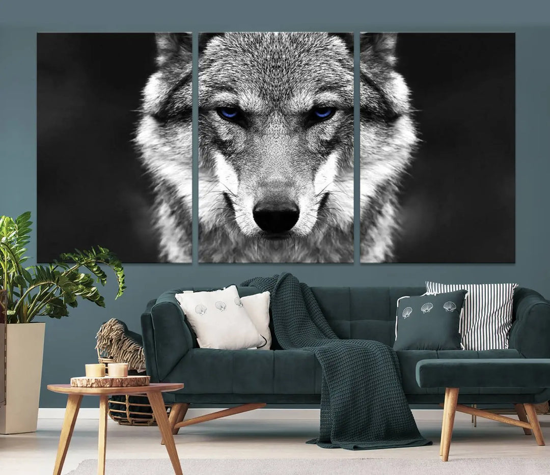 The Black and White Wild Wolf Wall Art Canvas Print, featuring a wolf with striking blue eyes, beautifully enhances any space. As a museum-quality piece with UV-protective coating and ready-to-hang design, it effortlessly brings elegance and convenience to your room.