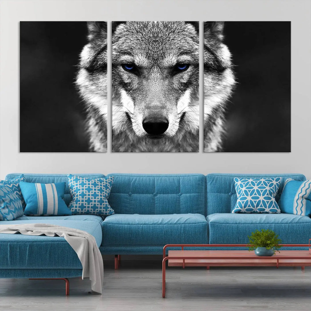 The Black and White Wild Wolf Wall Art Canvas Print, featuring a wolf with striking blue eyes, beautifully enhances any space. As a museum-quality piece with UV-protective coating and ready-to-hang design, it effortlessly brings elegance and convenience to your room.