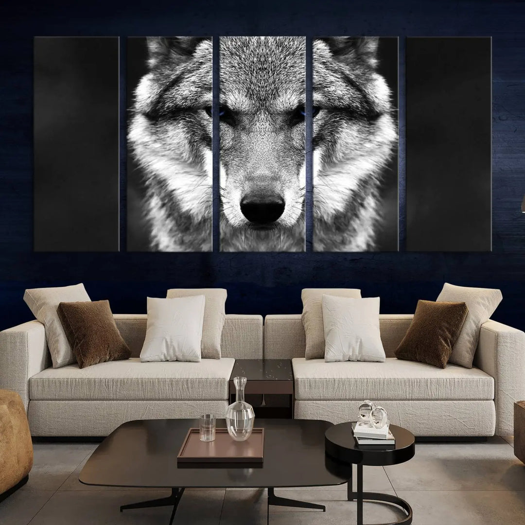 The Black and White Wild Wolf Wall Art Canvas Print, featuring a wolf with striking blue eyes, beautifully enhances any space. As a museum-quality piece with UV-protective coating and ready-to-hang design, it effortlessly brings elegance and convenience to your room.