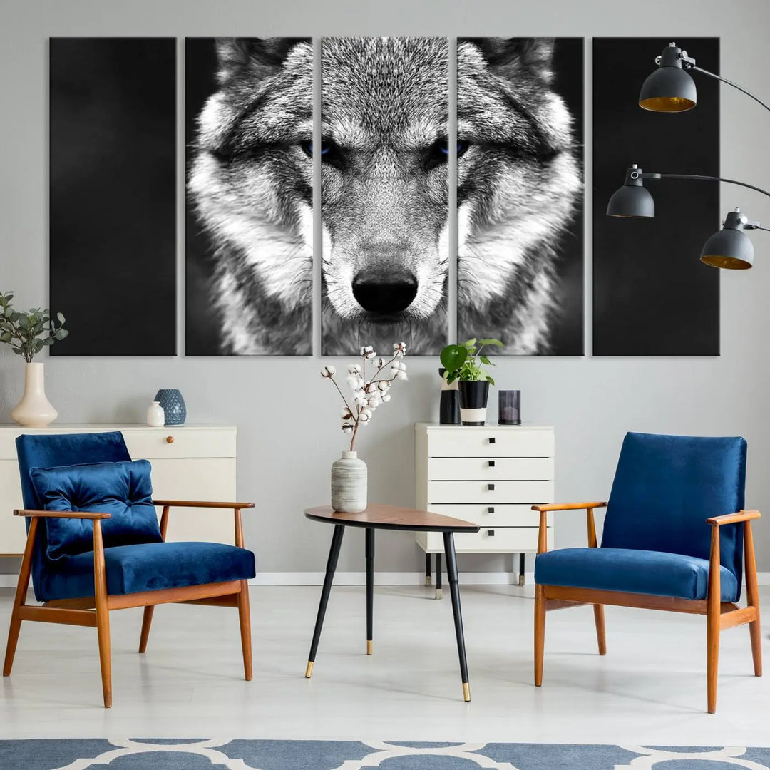 The Black and White Wild Wolf Wall Art Canvas Print, featuring a wolf with striking blue eyes, beautifully enhances any space. As a museum-quality piece with UV-protective coating and ready-to-hang design, it effortlessly brings elegance and convenience to your room.