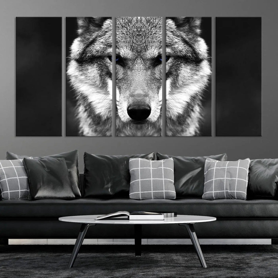 The Black and White Wild Wolf Wall Art Canvas Print, featuring a wolf with striking blue eyes, beautifully enhances any space. As a museum-quality piece with UV-protective coating and ready-to-hang design, it effortlessly brings elegance and convenience to your room.