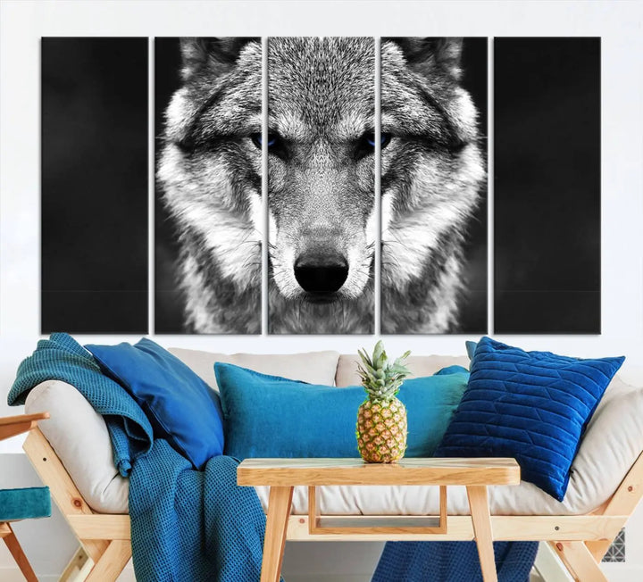 The Black and White Wild Wolf Wall Art Canvas Print, featuring a wolf with striking blue eyes, beautifully enhances any space. As a museum-quality piece with UV-protective coating and ready-to-hang design, it effortlessly brings elegance and convenience to your room.