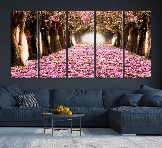 The Blossom Cherry Trees Wall Art Canvas Print, featuring a three-panel design on museum-quality canvas, showcases a tree-lined path with pink flowers. Each panel is gallery wrapped to add an extra layer of sophistication.