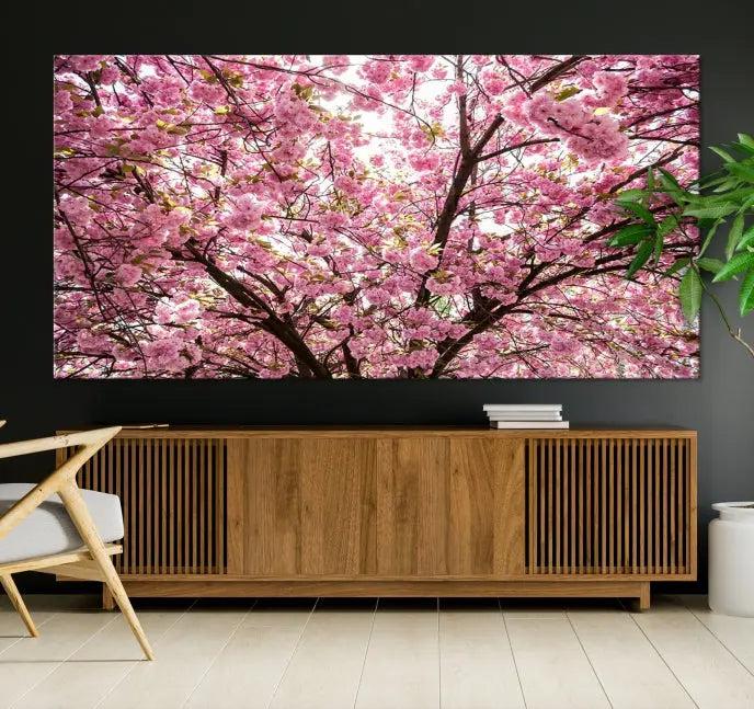 The Blossom Cherry Wall Art Canvas Print adds elegance to the cozy living room with its stunning triptych display. Professionally hand-assembled on museum-quality canvases, these pieces hang gracefully, featuring a UV-protective coating that ensures lasting vibrant beauty.