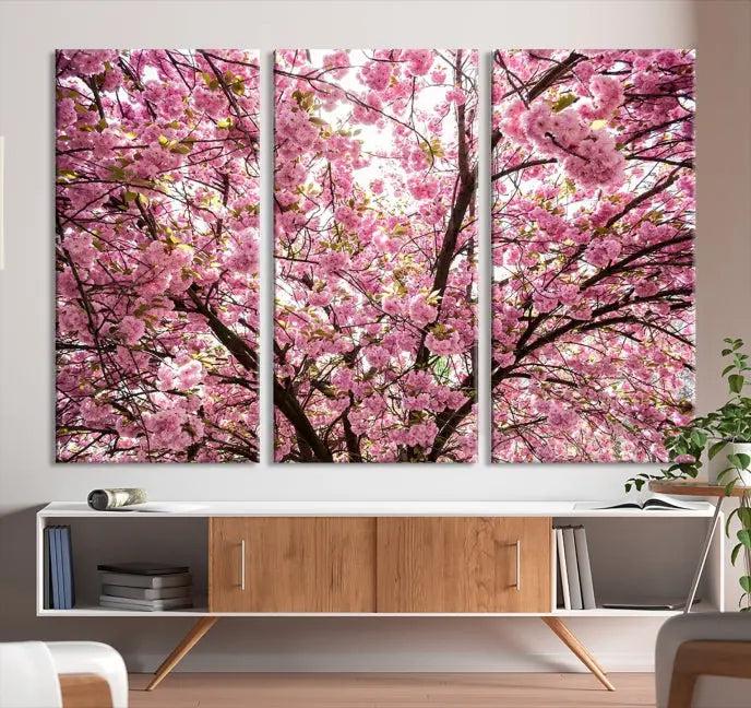 The Blossom Cherry Wall Art Canvas Print adds elegance to the cozy living room with its stunning triptych display. Professionally hand-assembled on museum-quality canvases, these pieces hang gracefully, featuring a UV-protective coating that ensures lasting vibrant beauty.