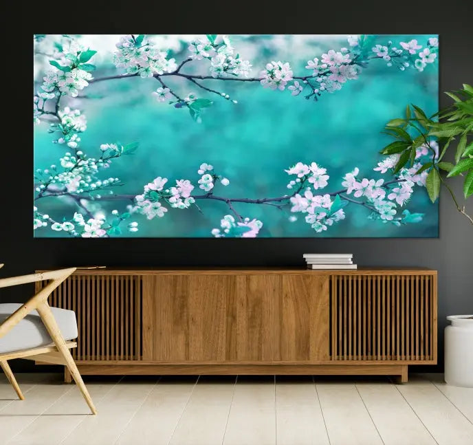 A living room enhanced by a gallery-wrapped "Blossoming Cherry in Spring" wall art canvas print. Enjoy this museum-quality piece with free shipping.