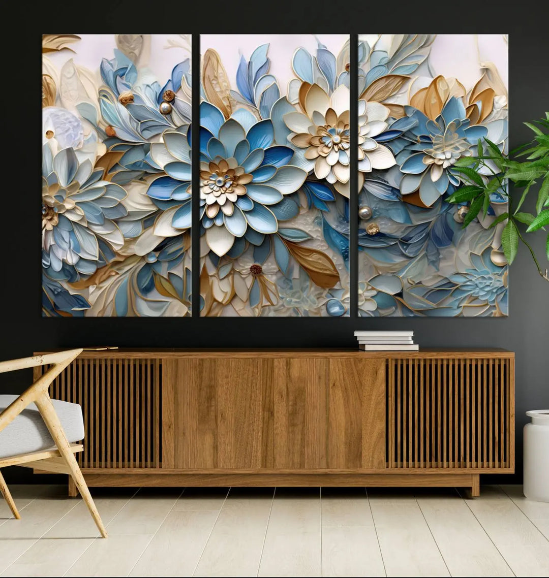 The Blu Abstract Flower Wall Art Canvas Print is a stunning triptych featuring blue and beige floral designs crafted on museum-quality canvas with high-resolution printing. This professionally hand-assembled masterpiece captures attention with its elegant artistry.