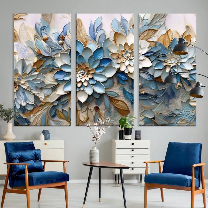 The Blu Abstract Flower Wall Art Canvas Print is a stunning triptych featuring blue and beige floral designs crafted on museum-quality canvas with high-resolution printing. This professionally hand-assembled masterpiece captures attention with its elegant artistry.