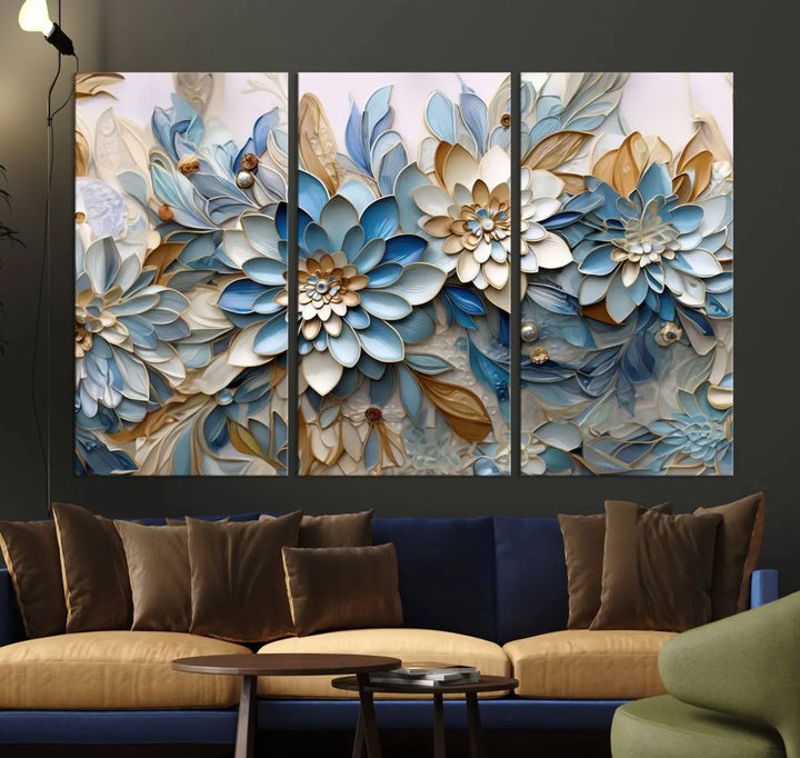 The Blu Abstract Flower Wall Art Canvas Print is a stunning triptych featuring blue and beige floral designs crafted on museum-quality canvas with high-resolution printing. This professionally hand-assembled masterpiece captures attention with its elegant artistry.