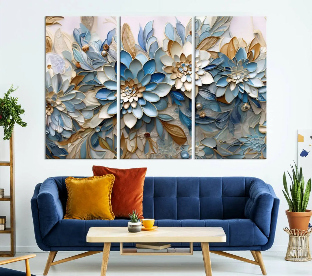 The Blu Abstract Flower Wall Art Canvas Print is a stunning triptych featuring blue and beige floral designs crafted on museum-quality canvas with high-resolution printing. This professionally hand-assembled masterpiece captures attention with its elegant artistry.