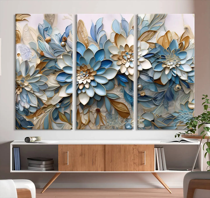 The Blu Abstract Flower Wall Art Canvas Print is a stunning triptych featuring blue and beige floral designs crafted on museum-quality canvas with high-resolution printing. This professionally hand-assembled masterpiece captures attention with its elegant artistry.