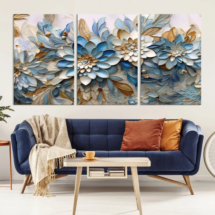 The Blu Abstract Flower Wall Art Canvas Print is a stunning triptych featuring blue and beige floral designs crafted on museum-quality canvas with high-resolution printing. This professionally hand-assembled masterpiece captures attention with its elegant artistry.