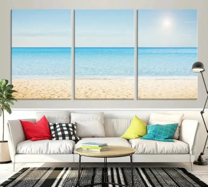 The Blue Beach and Sea Wall Art Canvas Print, arranged in a three-panel beach scene, elegantly decorates a black wall. Transform your space into a coastal oasis with this stunning piece, and enjoy free shipping on your purchase.