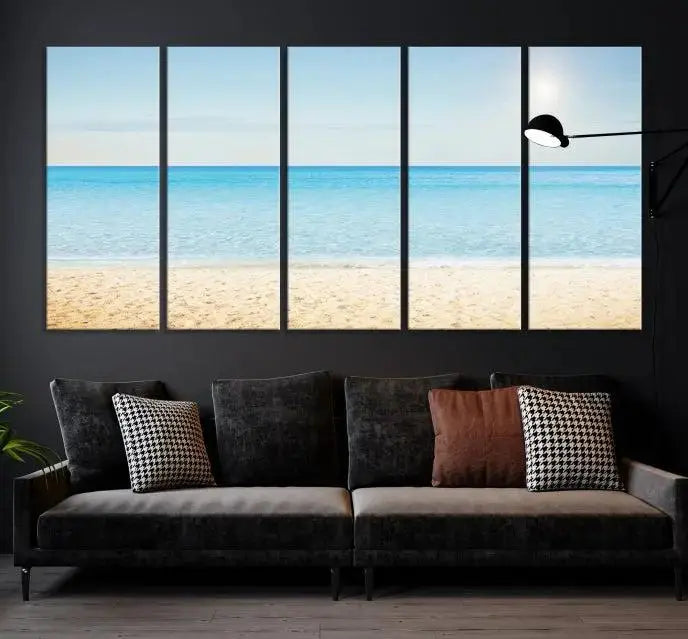 The Blue Beach and Sea Wall Art Canvas Print, arranged in a three-panel beach scene, elegantly decorates a black wall. Transform your space into a coastal oasis with this stunning piece, and enjoy free shipping on your purchase.