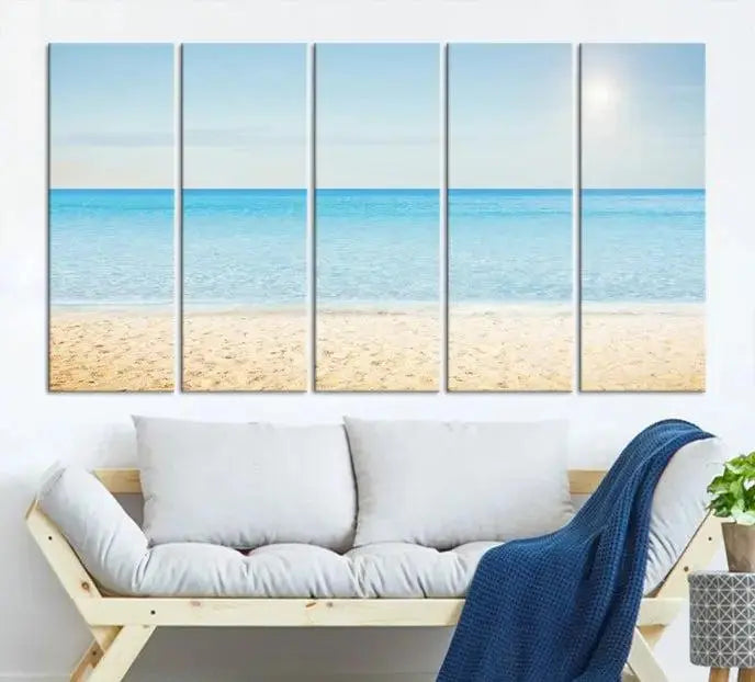 The Blue Beach and Sea Wall Art Canvas Print, arranged in a three-panel beach scene, elegantly decorates a black wall. Transform your space into a coastal oasis with this stunning piece, and enjoy free shipping on your purchase.