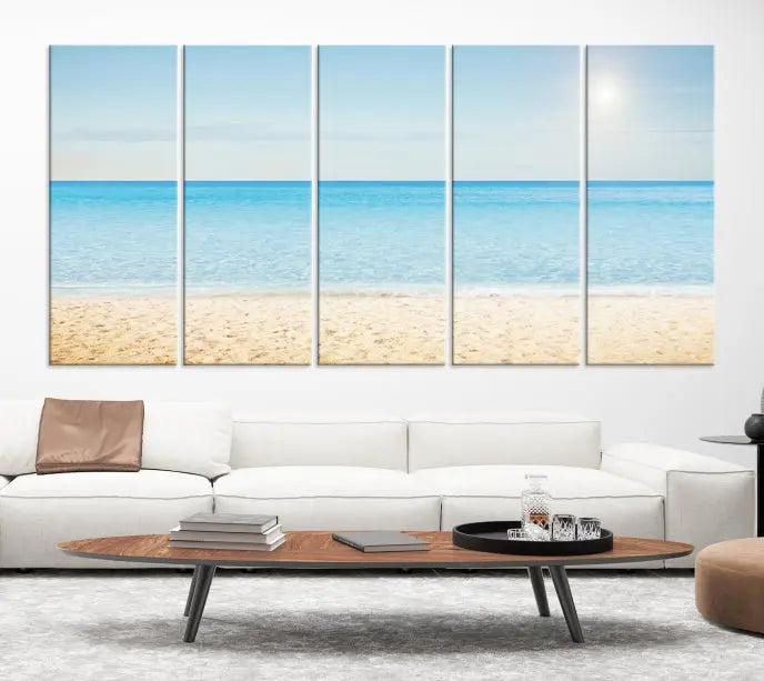 The Blue Beach and Sea Wall Art Canvas Print, arranged in a three-panel beach scene, elegantly decorates a black wall. Transform your space into a coastal oasis with this stunning piece, and enjoy free shipping on your purchase.