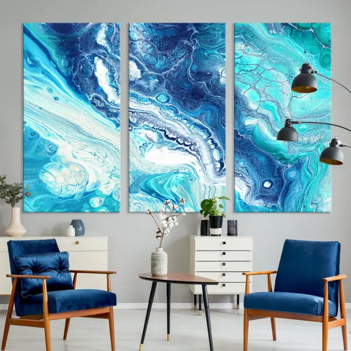 The contemporary living room features the Blue Bubble Marble Fluid Effect Wall Art Abstract Canvas Wall Art Print, a stunning gallery-wrapped triptych on museum-quality canvases with UV-protective coating.