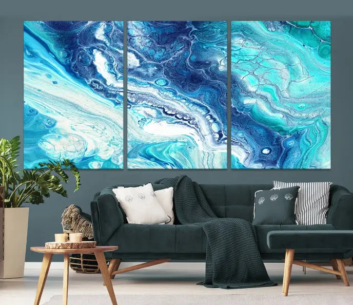 The contemporary living room features the Blue Bubble Marble Fluid Effect Wall Art Abstract Canvas Wall Art Print, a stunning gallery-wrapped triptych on museum-quality canvases with UV-protective coating.