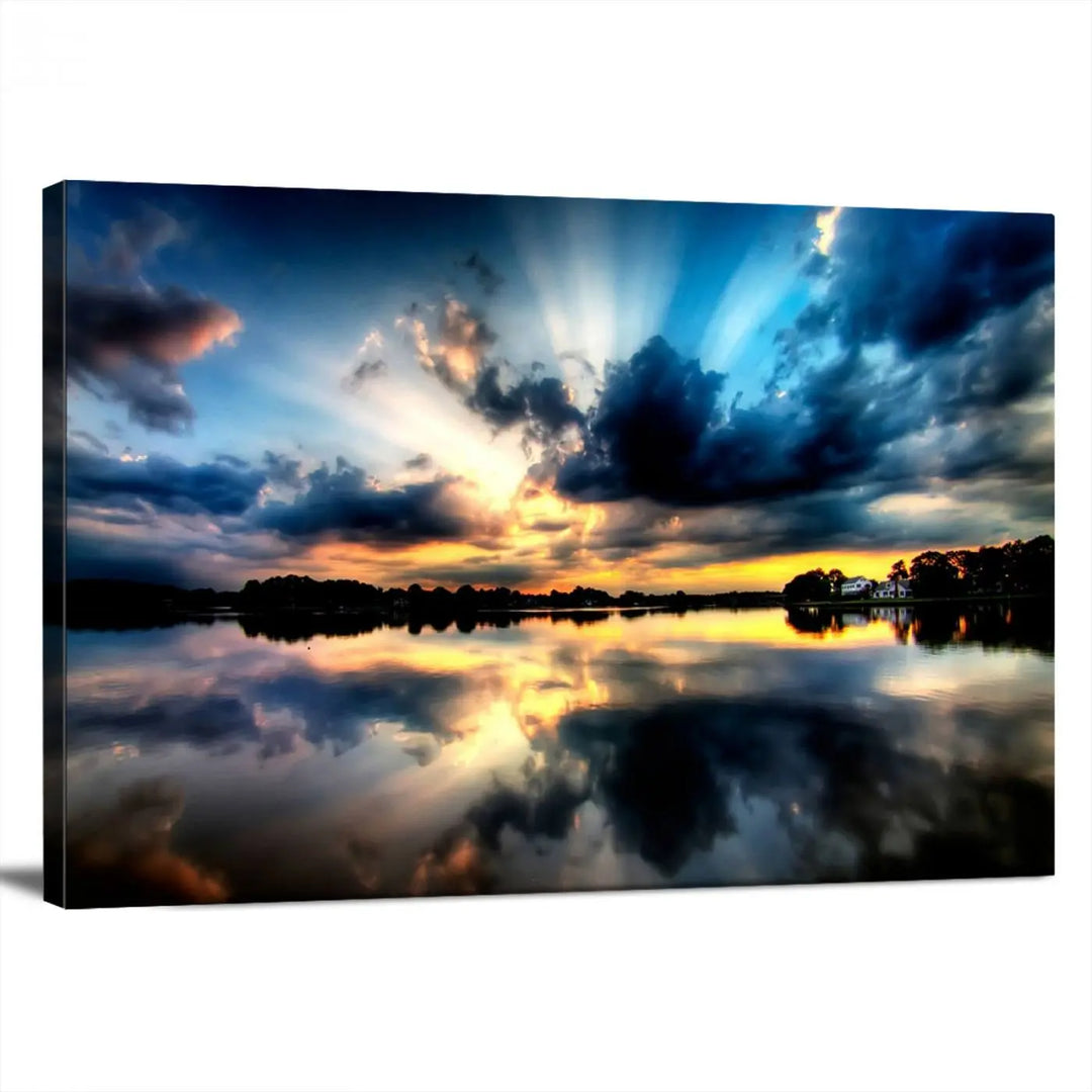 The "Blue Clouds and Sunshine Sunset Wall Art Canvas Print" perfectly captures a stunning sunset over a calm lake, where dramatic clouds and sunrays are beautifully reflected in the water. This museum-quality, ready-to-hang piece flawlessly preserves nature's breathtaking moment.