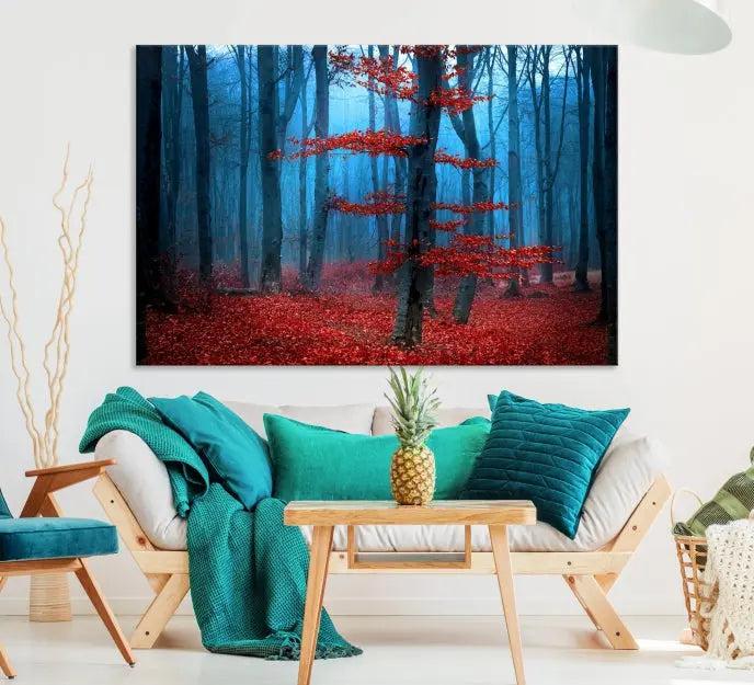 The Blue Dark Forest Wall Art Canvas Print features a misty forest with red leaves and is crafted on museum-quality canvas with a UV-protective coating.