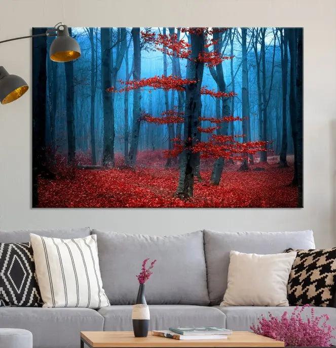 The Blue Dark Forest Wall Art Canvas Print features a misty forest with red leaves and is crafted on museum-quality canvas with a UV-protective coating.