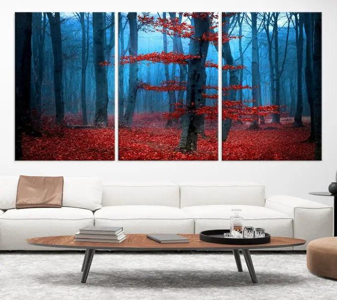 The Blue Dark Forest Wall Art Canvas Print features a misty forest with red leaves and is crafted on museum-quality canvas with a UV-protective coating.