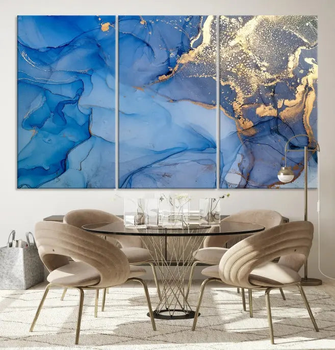 Modern living room featuring the Blue Gold Marble Fluid Canvas Wall Art that showcases three-panel abstract designs in blue and gold on museum-quality canvas. These art pieces are professionally hand-assembled for an exquisite finish.