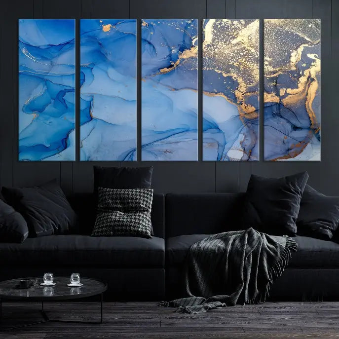 Modern living room featuring the Blue Gold Marble Fluid Canvas Wall Art that showcases three-panel abstract designs in blue and gold on museum-quality canvas. These art pieces are professionally hand-assembled for an exquisite finish.