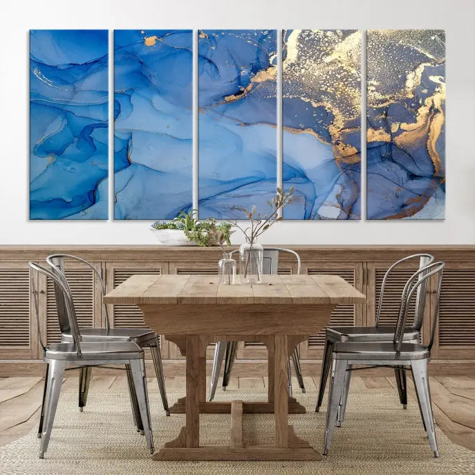 Modern living room featuring the Blue Gold Marble Fluid Canvas Wall Art that showcases three-panel abstract designs in blue and gold on museum-quality canvas. These art pieces are professionally hand-assembled for an exquisite finish.