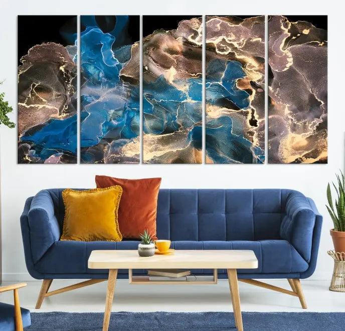 The Blue Golden Marble Wall Art Abstract Canvas Print, ready to hang, enhances the elegance of the modern living room.