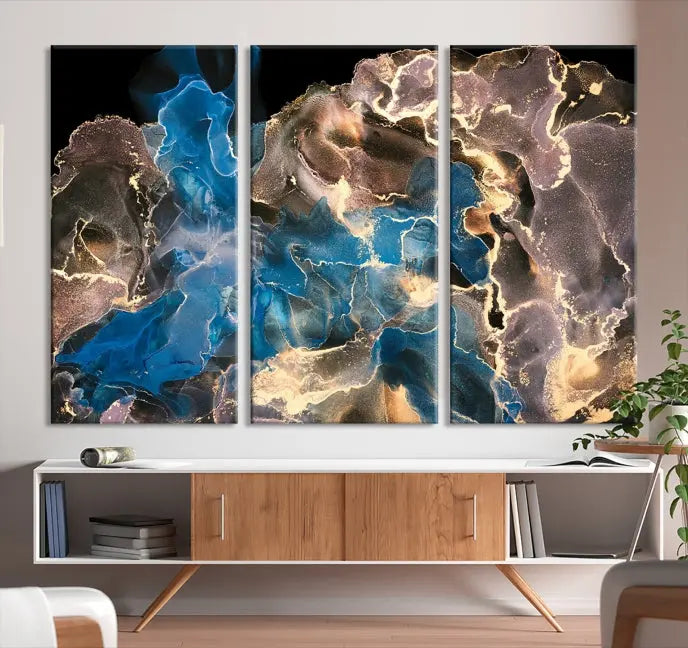 The Blue Golden Marble Wall Art Abstract Canvas Print, ready to hang, enhances the elegance of the modern living room.