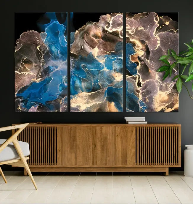 The Blue Golden Marble Wall Art Abstract Canvas Print, ready to hang, enhances the elegance of the modern living room.