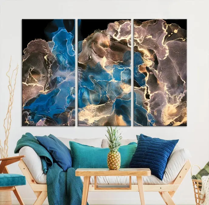 The Blue Golden Marble Wall Art Abstract Canvas Print, ready to hang, enhances the elegance of the modern living room.